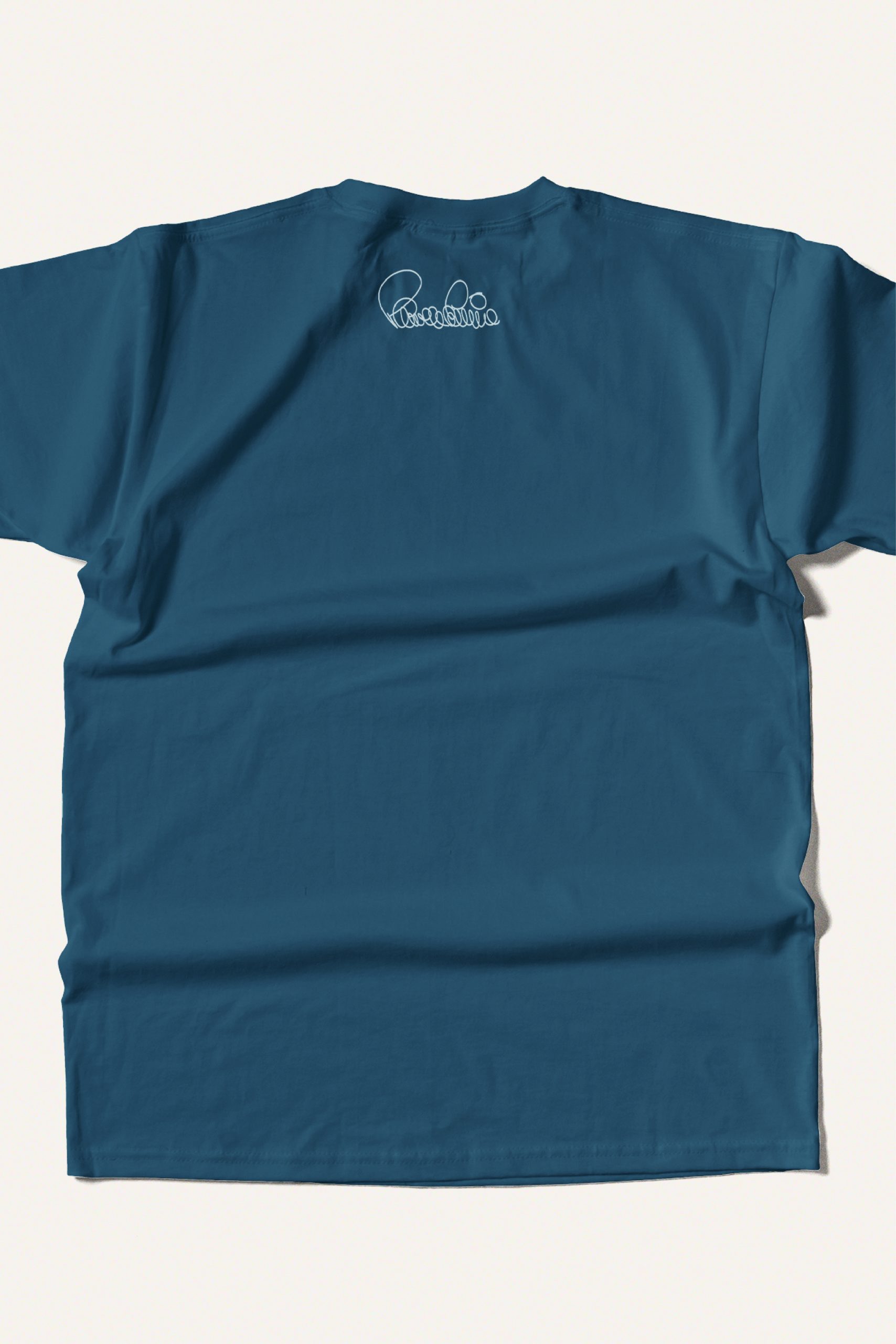 Camiseta azul petróleo de la colección Caminar inspirada en Paco de Lucía